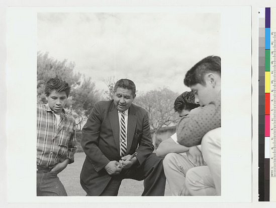 Hearst Museum object titled Black-and-white negative, accession number 15-19489, described as Indian boys and Sidney Parrish playing stick game