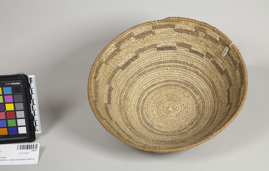 Hearst Museum object 3 of 3 titled Bowl basket, accession number 1-28451, described as Coiled basket, shallow bowl-shaped, 6 brown bands. Made with peeled shoots and Xerophyllum leaves.