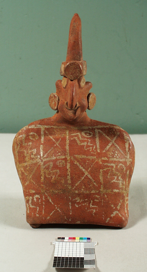 Hearst Museum object titled Figurine, accession number 3-3595, described as Red pottery effigy of seated person with garment completely covering front; sugarloaf headdress