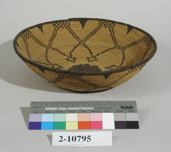 Hearst Museum object titled Basket, accession number 2-10795, described as Round. Coiled. Black decoration. Geometrical figures.