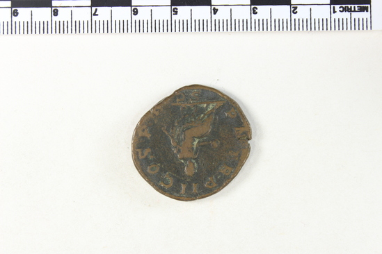 Hearst Museum object 4 of 8 titled Coin: æ sestertius, accession number 8-6243, described as Coin, Æ; Sestertius. 17.85 grams. Philippus Senior, 244-249 AD. Obverse: IMP M IVL PHILIPPVS AVG, Bust facing right, laureate, draped. Reverse: PM TRP II COS PP, SC in exergue, Emperor seated facing left on curule chair, holding globe in right hand and short scepter in left.