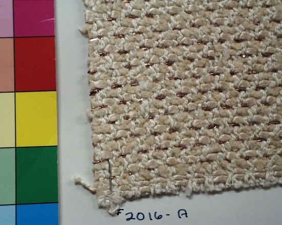 Hearst Museum object titled Textile sample, accession number 2-63744, described as Handwoven twill textile sample of cotton, metal and synthetic materials.  White and copper in color.