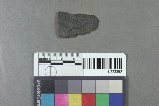 Hearst Museum object titled Projectile point, accession number 1-223392, described as Basalt point fragment