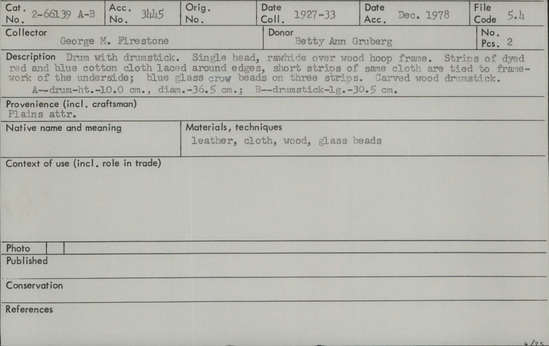 Documentation associated with Hearst Museum object titled Drum and drumstick, accession number 2-66139a,b, described as a) Drum.  Single head, rawhide over wood hoop frame.  Strips of dyed red and blue cotton cloth laced around eges, short strips of of same cloth are tied to framework of the underside; blue glass crow beads on three strips.  b) Carved wood drumstick.