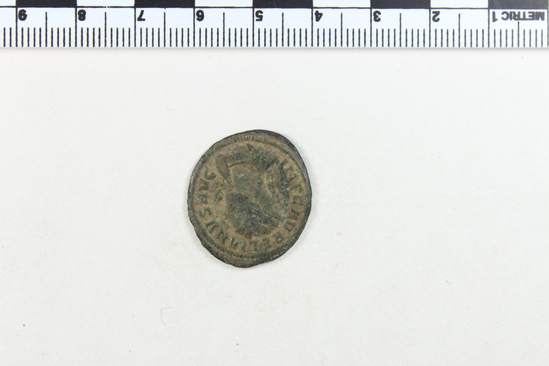 Hearst Museum object 8 of 8 titled Coin: billon antoninianus, accession number 8-6012, described as Coin: Antoninianus; AR [?], Æ; Aurelianus - 3.03 grams. Obverse: IMP C AVRELIANVS AVG - Bust facing right radiate, cuirassed. Reverse: CONCORDIA MILITVM -  Emperor and Concordia clasping hands, [untranscribable symbols].