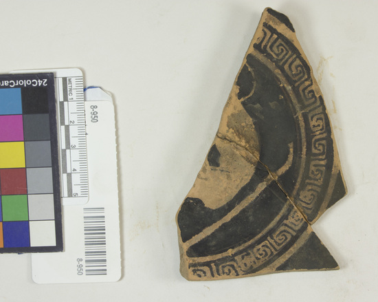 Hearst Museum object titled Kylix fragment, accession number 8-950, described as Red-figured center: leaper