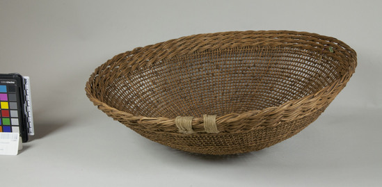 Hearst Museum object 2 of 2 titled Basket, accession number 1-24067, described as Openwork twined basket.  4 heavy twisted bands around rim, supported by cotton string wrapping.