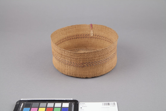 Hearst Museum object 3 of 3 titled Basket, accession number 2-33868, described as Short, cylindrical twined basket with simple band design in red and blue; several ridges of 3-strand twining.