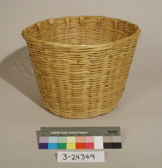 Hearst Museum object titled Basket, accession number 3-24349, described as Basket: Deep, round; wicker woven cane.