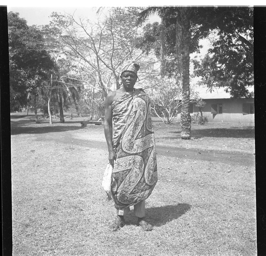 Hearst Museum object titled Black-and-white negative, accession number 15-30777, described as Black and white negative, 2.25" Nigeria, Meko, Man, dressed up, 1951