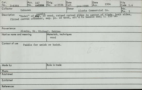 Documentation associated with Hearst Museum object titled Paddle, accession number 2-6344, described as Model" of paddle, of wood, raised carved ridge in center ridge in center of blade, both sides, fitted carved crossbar, seperate pieces of wood, attached to handle end.