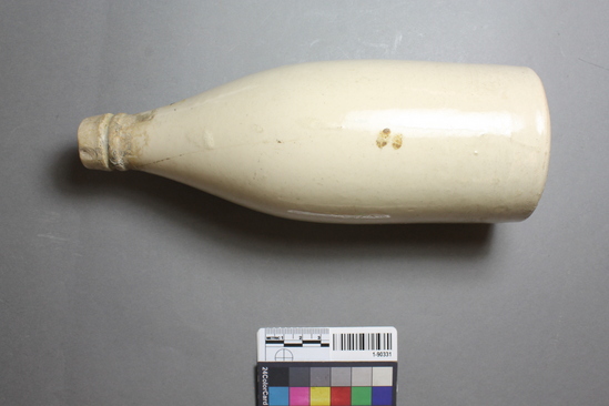 Hearst Museum object titled Bottle and soil, accession number 1-90331, described as Crockery bottle and soil sample