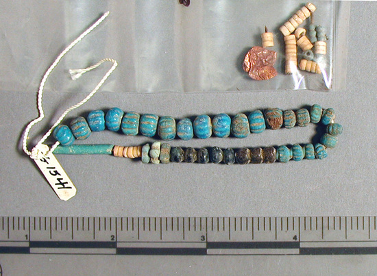 Hearst Museum object titled Beads, accession number 6-1541, described as Beads: 34 blue and black glaze, 5 green, 1 blue cylindrical small cluster shell, 1 flake gold leaf