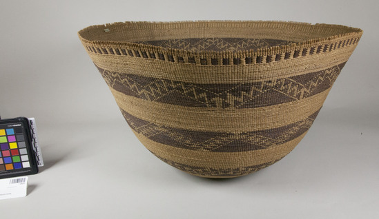 Hearst Museum object 2 of 2 titled Basket, accession number 1-28429, described as Twined, flaring.  5 brown bands in various designs.