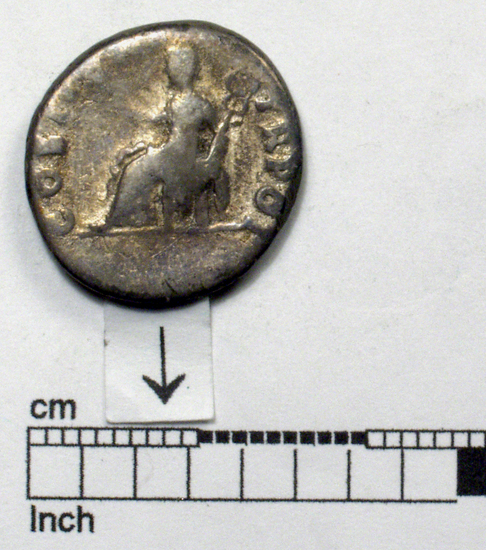 Hearst Museum object 5 of 8 titled Coin: ar denarius, accession number 8-4665, described as Coin; AR; Denarius; Roman. 3.07 grams, 18 mm. Vespasian, 69-70 AD. Rome, Italy. Obverse: IMP CAESAR VESPASIANVS AVG, bust r. laureate. Reverse: COSITER TR POT, Pax seated left holding caduceus and branch.