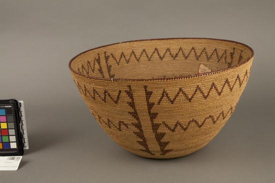 Hearst Museum object 2 of 2 titled Bowl basket, accession number 1-70303, described as Coiled basket, bowl shape. Design houses and snake tracks.