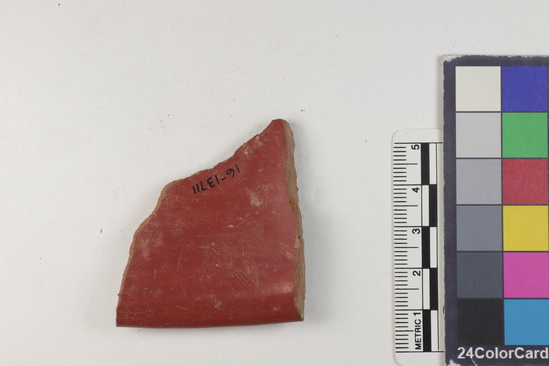 Hearst Museum object titled Potsherd, accession number 16-13711, described as Rim sherd; reddish; background of red slip, design of yellow and black slip; incised pattern of fine lines