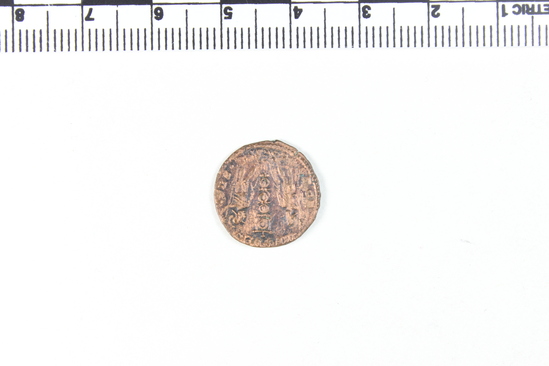 Hearst Museum object titled Coin: æ 4, accession number 8-7354, described as Coin, AES Follis 4.       1.33 grams. 16mm. Obverse: Constantus II Reverse: Standard between 2 soldiers