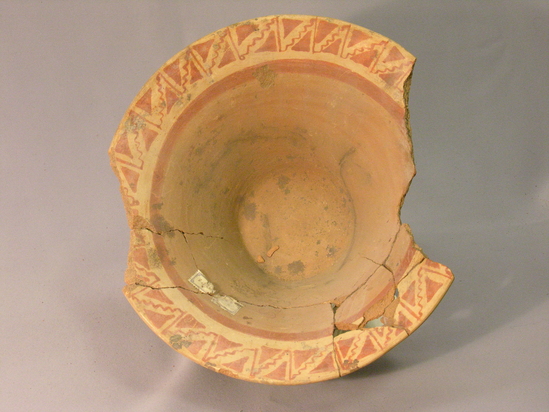 Hearst Museum object 4 of 4 titled Broken bowl, accession number 4-3200, described as Flaring flat-bottomed bowl, red design on lip. Broken