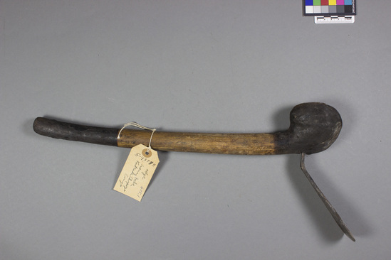 Hearst Museum object titled Adze, accession number 5-4373, described as Adze; cracked metal blade; club shaped wooden handle with burned ends; 43 cm l.