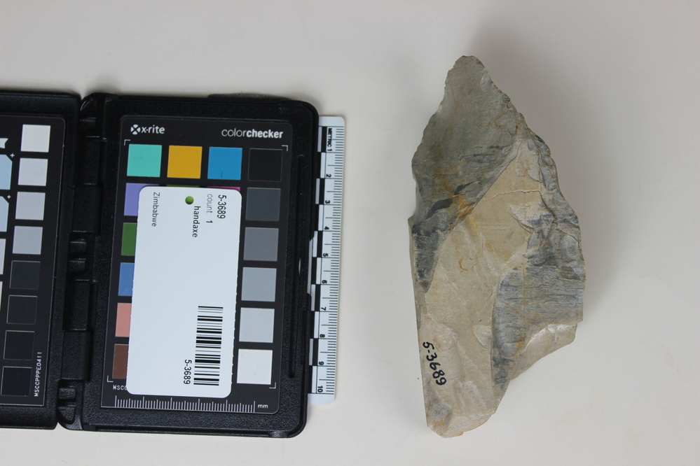 Hearst Museum object 2 of 2 titled Handaxe, accession number 5-3689, described as Crude hand-axe; banded grey-black flint; 13.5 x 6.9 cm.