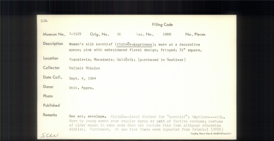 Documentation associated with Hearst Museum object titled Kerchief, accession number 7-5125, described as Woman's silk kerchief (rizince-koprineno); worn as a decorative apron; pink with embroidered floral design; fringed; 31" square. Rizince-local dialect for kerchief; kaprineno- silk. Worn by young women over regular apron as part of festive costume; costume of older women in same area does not include this item, although otherwise similar. At one time these were imported from Istanbul or Solika via Debar. Still worn at time of collection, 1964. 7-5119-5128 comprise a complete costume.