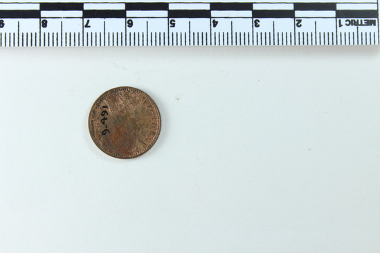 Hearst Museum object titled Coin: copper ¹⁄₁₂ anna, accession number 9-491, described as Coin; copper ¹⁄₁₂ Anna. 1901. Obverse: Crowned bust of Victoria facing left. Lettering: VICTORIA EMPRESS. Reverse: Value above denomination, dividing line, country, date - all within beaded circle. Ornate intertwined leaves pattern surrounding. Lettering: 1/12 ANNA—INDIA 1890. Plain edge.