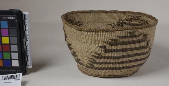 Hearst Museum object 2 of 2 titled Cooking basket, accession number 1-12385, described as Cooking basket; twined. Warp is twisted Tule skin (Schoenoplectus acutus), weft is twisted Tule and Cattail (Typha latifolia). Brown pattern is Tule root. Small, with red striped figure.  Indigenous name: kala.