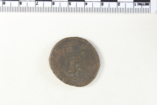 Hearst Museum object 7 of 7 titled Coin: æ sestertius, accession number 8-6493, described as Coin. Æ. Roman (19.0 grams; 32 mm.) Gordian III Ru. Ceves, AD.   Rome. Obverse: IMP GORDIANVS PIVS FEL AVG - Bust facing right, laureate and draped. Reverse: P M T R P IIII COS  III P P - Apollo seated facing left, holding branch and resting left arm on lyre; in exergue, S C.