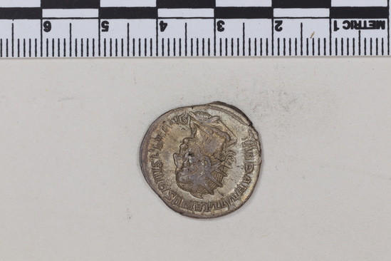 Hearst Museum object 6 of 8 titled Coin: billon antoninianus, accession number 8-4374, described as Coin; Billon; Antoninianus; Roman. 3.25 grams, 22 mm. Aemilian, 253-254. Obverse: IMP AEMILIANVS PIVS FEL AVG, bust r. radiate, draped, cuirassed. Reverse: VICTORIA AVG, Victory standing l.