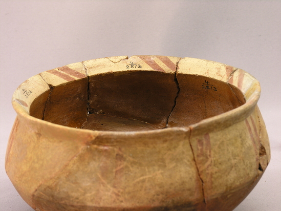 Hearst Museum object 2 of 7 titled Broken bowl, accession number 4-2813, described as Bowl of red pottery, white shoulder painted with pairs of red lines. Broken