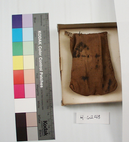 Hearst Museum object titled Bag, accession number 4-6248, described as Small bag containing stone covered with fibre