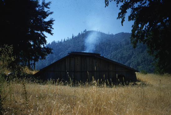 Hearst Museum object titled Color slide, accession number 25-4329, described as Rebuilt sacred house at Takemilding.