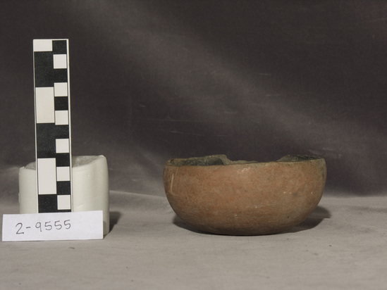 Hearst Museum object titled Bowl, accession number 2-9555, described as small, smooth, red bowl Notice: Image restricted due to its potentially sensitive nature. Contact Museum to request access.