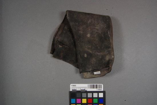 Hearst Museum object titled Boot (footwear) fragment, accession number 1-159925, described as Fragment of a leather boot leg with sewing seams evident