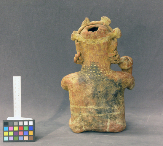 Hearst Museum object 3 of 3 titled Figurine, accession number 3-3608, described as Red pottery effigy of seated man with gourd rattle