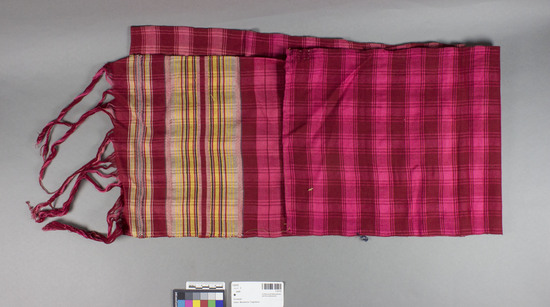 Hearst Museum object titled Sash, accession number 7-5113, described as Woman’s cotton sash ( pojas-Macedonian for “ sash”); red-brown and pink checkered design; multicolored weft design on one end; fringed on one end; 83 inches long excluding fringe