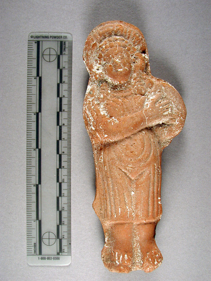 Hearst Museum object 6 of 7 titled Female figurine, accession number 6-20336, described as Pottery woman holding round object. Roman town.