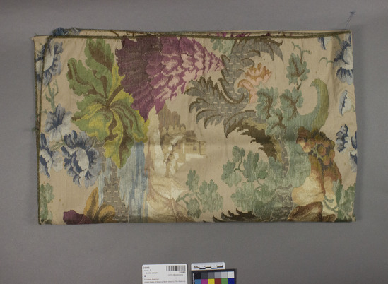 Hearst Museum object titled Textile sample, accession number 2-62469, described as Strip; silk or rayon?, single face brocaded ribbed plain weave, varicolored, floral, foliage and scene motives, Jacquard looms
