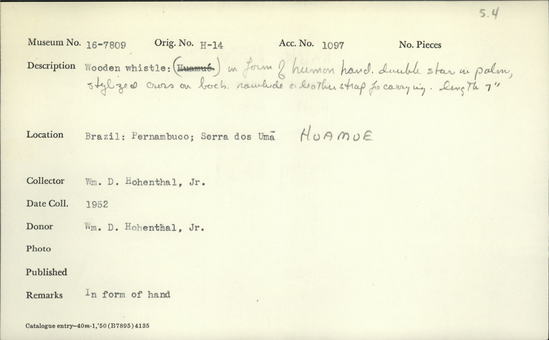 Documentation associated with Hearst Museum object titled Whistle, accession number 16-7809, described as Wooden whistle in form of human hand, double star in palm, stylized cross on back, rawhide on leather strap for carrying length 7 inches.