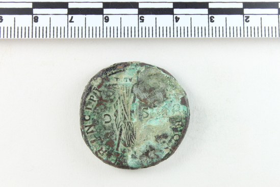 Hearst Museum object 8 of 14 titled Coin: æ sestertius, accession number 8-4007, described as Coin; AE; Sestertius; Roman. Trajan, 104-111 AD. Rome, Italy. Obverse: IMP CAES NERVAE TRAIANO AVG GERM DAC PM TRP COS V PP, Bust laureate and draped. Reverse: [SPQR OPTIMO] PRINCIPI, [ARAB] ADQ [VIS] in ex (as on denarii); S C in field. CF Coin 4008.