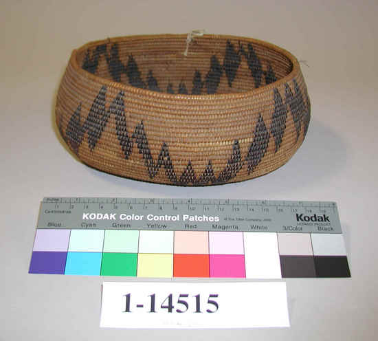 Hearst Museum object 1 of 2 titled Basket, accession number 1-14515, described as Basket; coiled. Warp is possibly Willow (Salix), weft is Redbud (Cercis occidentalis). Black pattern is dyed Redbud bark. Zigzag design of black rhomboidal figures.