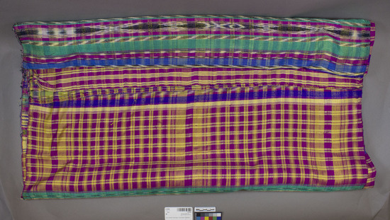 Hearst Museum object titled Skirt, accession number 3-29438b, described as Skirt, skirt length is silk woven in a bright multi-colored plaid and stripe pattern. Skirt, length 480.0 cm, width 96.5 cm