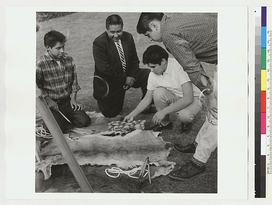 Hearst Museum object titled Black-and-white negative, accession number 15-19496, described as Indian boys and Sidney Parrish playing stick game