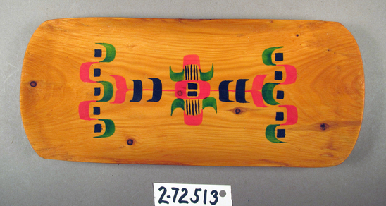 Hearst Museum object titled Rectangular bowl, accession number 2-72513, described as Wood tray with green, red, and black designs. Label with "NG-11" affixed to back.