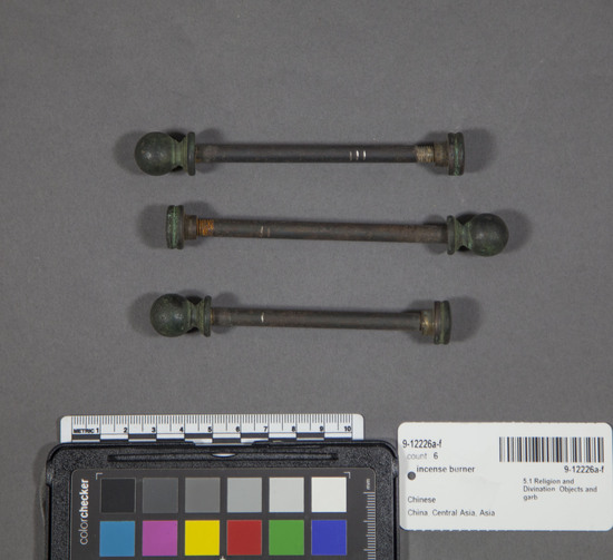 Hearst Museum object 15 of 16 titled Incense burner, accession number 9-12226a-f, described as Three phoenixes on stand, cast bronze and cloisonne. A) 3-lobed stand, edge has openwork design with stylized floral motif, 1 phoenix soldered in place, width 37.5 cm, height 31.5 cm; B) wing, bronze, and cloisonne, length 14.4 cm; C) bronze and cloisonne  phoenix, beak to tail length 29.7 cm; D) wing, bronze and cloisonne, length 14.6 cm; E) bronze and cloisonne phoenix, beak to tail length 24.3 cm; F) lid, bronze, length 8.2 cm