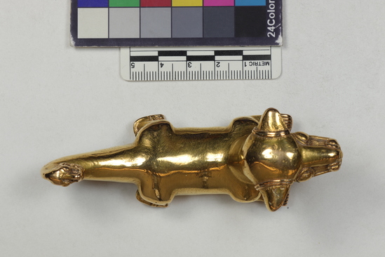 Hearst Museum object 4 of 6 titled Dog figurine, accession number 3-3420, described as Gold figurine of a dog.