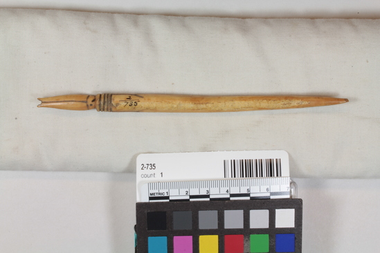 Hearst Museum object 2 of 2 titled Awl, accession number 2-735, described as Ivory, fish-shaped handle, tip broken.