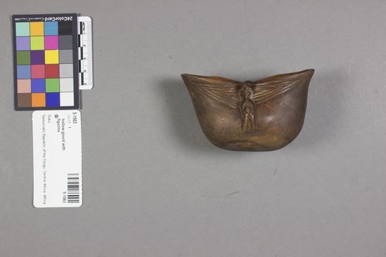 Hearst Museum object titled Hollow gourd with figurine, accession number 5-1563, described as Two-mouthed cup for drinking palm wine