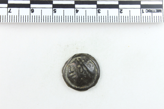 Hearst Museum object 3 of 6 titled Coin: æ, accession number 8-7827, described as Coin. Gallic, Cast Æ. (3.97 grams, 18 mm). Obverse: Head facing left. Reverse: Horse facing left.